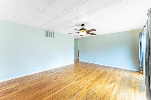 204 N Rohlwing Rd, Palatine, IL 60074 - unfurnished room featuring baseboards, light wood finished floors, and a ceiling fan