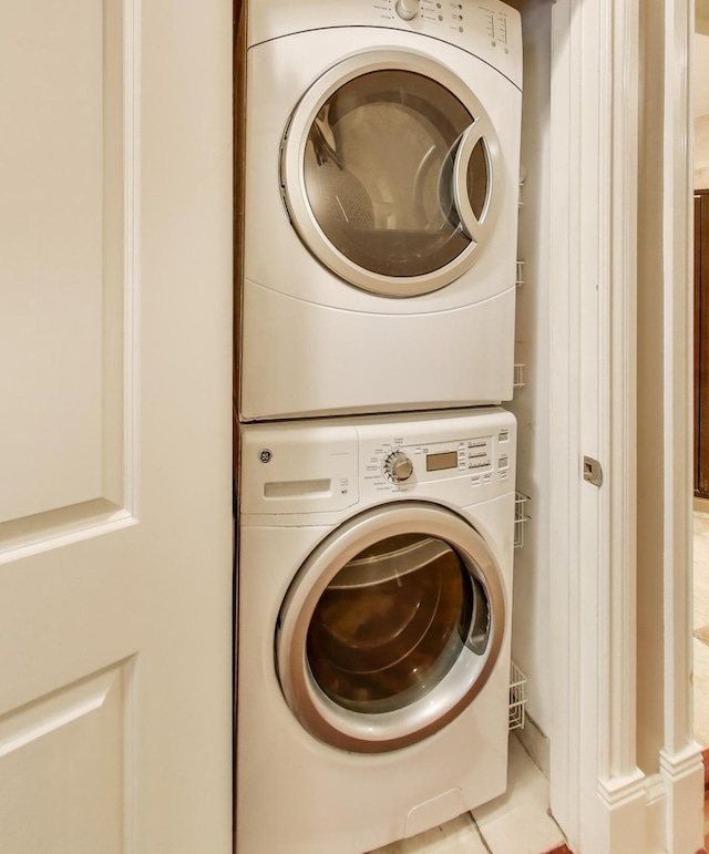laundry area with estacked washer and dryer