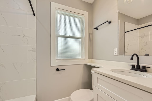 full bath featuring toilet, walk in shower, a healthy amount of sunlight, and vanity