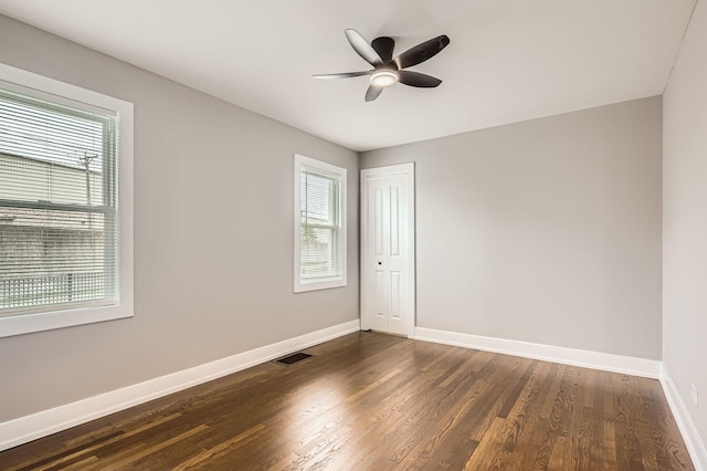 empty room with visible vents, baseboards, and a healthy amount of sunlight