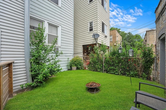 5017 N California Ave, Chicago, IL 60625 - view of grassy yard featuring a fire pit