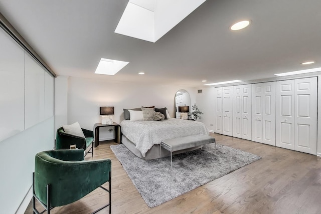 1426 N Cleveland Ave Unit 3, Chicago, IL 60610 - bedroom with a skylight, light wood-style floors, and recessed lighting