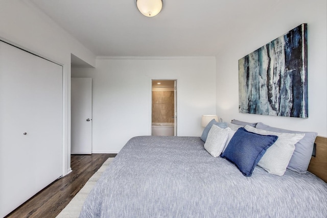 1426 N Cleveland Ave Unit 3, Chicago, IL 60610 - bedroom with dark wood-type flooring, ensuite bath, and crown molding