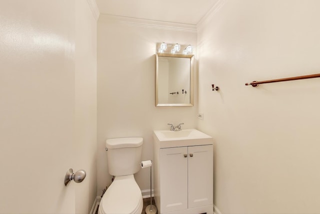 1426 N Cleveland Ave Unit 3, Chicago, IL 60610 - bathroom featuring ornamental molding, toilet, vanity, and baseboards