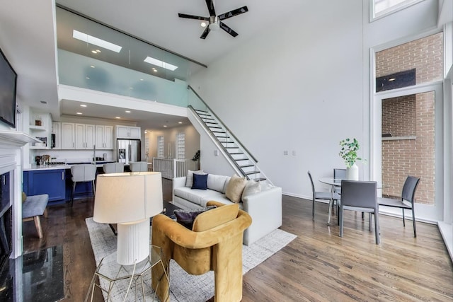 1426 N Cleveland Ave Unit 3, Chicago, IL 60610 - living area with a high ceiling, stairs, dark wood-style floors, ceiling fan, and recessed lighting