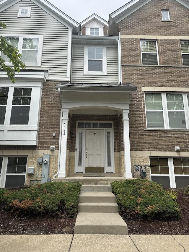 5588 Cambridge Way, Hanover Park, IL 60133 - entrance to property featuring brick siding