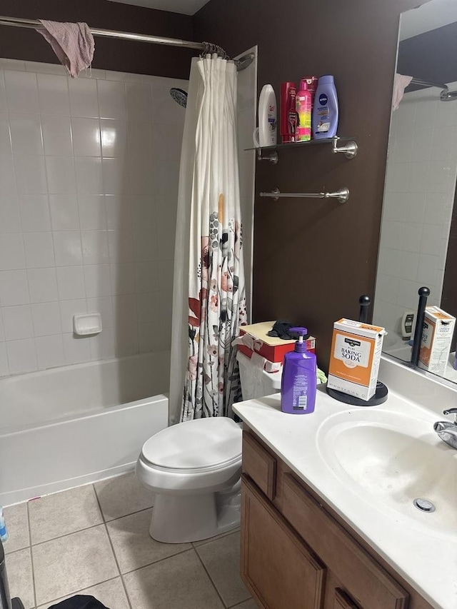 5588 Cambridge Way, Hanover Park, IL 60133 - full bathroom with toilet, tile patterned flooring, vanity, and shower / tub combo