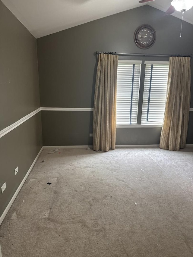 5588 Cambridge Way, Hanover Park, IL 60133 - unfurnished room featuring a ceiling fan, lofted ceiling, carpet floors, and baseboards