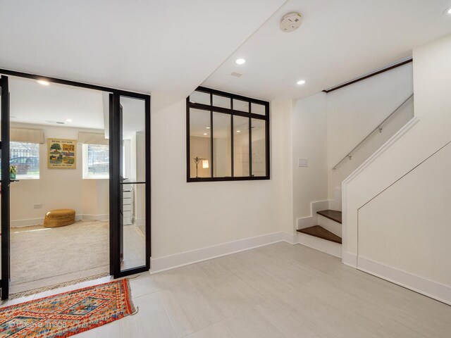 2426 W Mclean Ave, Chicago, IL 60647 - empty room featuring a smoke detector, stairs, baseboards, and recessed lighting