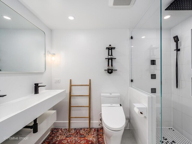 2426 W Mclean Ave, Chicago, IL 60647 - full bath with toilet, a shower stall, recessed lighting, and a sink