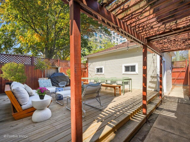2426 W Mclean Ave, Chicago, IL 60647 - wooden terrace with outdoor dining area, a pergola, a fenced backyard, and area for grilling