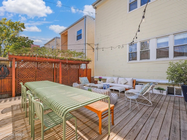 2426 W Mclean Ave, Chicago, IL 60647 - wooden deck with an outdoor living space