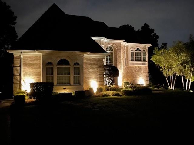 view of front of property with brick siding