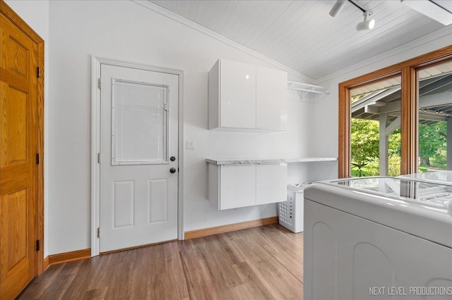 6N198 Old Homestead Rd, Saint Charles, IL 60175 - laundry area featuring light wood-style floors, baseboards, cabinet space, ornamental molding, and wood ceiling