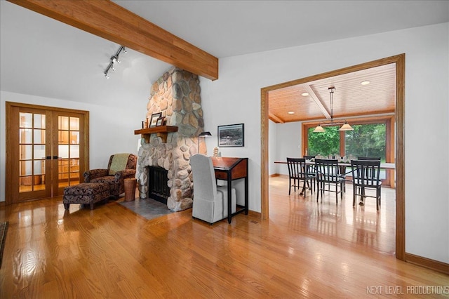 6N198 Old Homestead Rd, Saint Charles, IL 60175 - living room featuring french doors, wood finished floors, baseboards, a fireplace, and recessed lighting