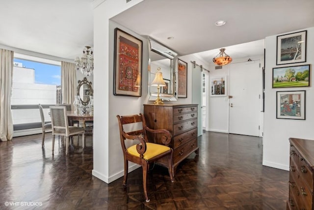 sitting room featuring baseboards and recessed lighting