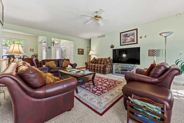 638 Roxbury Rd, Rockford, IL 61107 - living room featuring carpet, a ceiling fan, and baseboards