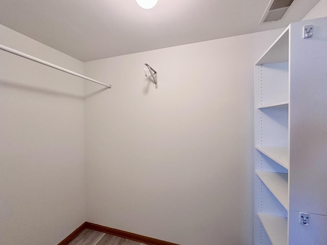 2278 Twilight Dr, Aurora, IL 60503 - spacious closet with visible vents and wood finished floors