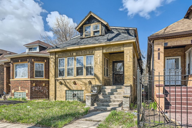 7002 S Hermitage Ave, Chicago, IL 60636 - bungalow-style house featuring brick siding and fence
