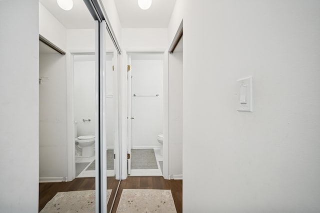 925 Spring Hill Dr Unit 211, Northbrook, IL 60062 - hallway with wood finished floors and baseboards