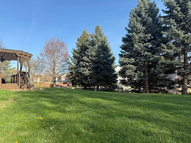 view of yard with a pergola