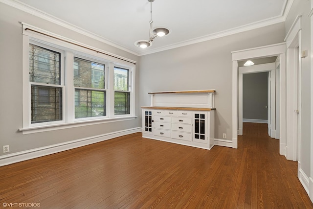 6104 S Kimbark Ave Unit 1, Chicago, IL 60637 - unfurnished living room with dark wood-style flooring, crown molding, and baseboards