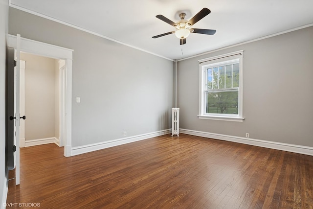 6104 S Kimbark Ave Unit 1, Chicago, IL 60637 - unfurnished room featuring wood finished floors, baseboards, crown molding, a ceiling fan, and radiator heating unit