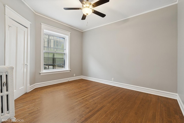6104 S Kimbark Ave Unit 1, Chicago, IL 60637 - spare room featuring wood finished floors, baseboards, crown molding, and ceiling fan
