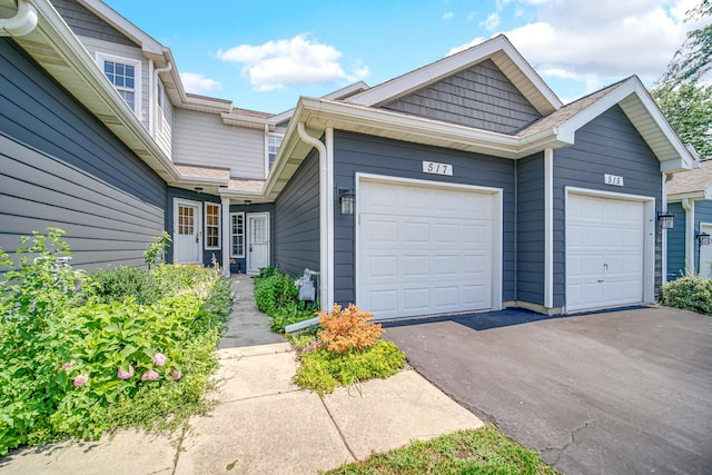 517 Woodcrest Dr, Mundelein, IL 60060 - view of front of home featuring driveway and a garage
