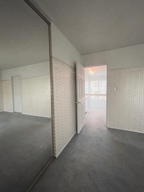 610 E Woodfield Trl, Roselle, IL 60172 - hallway featuring dark carpet
