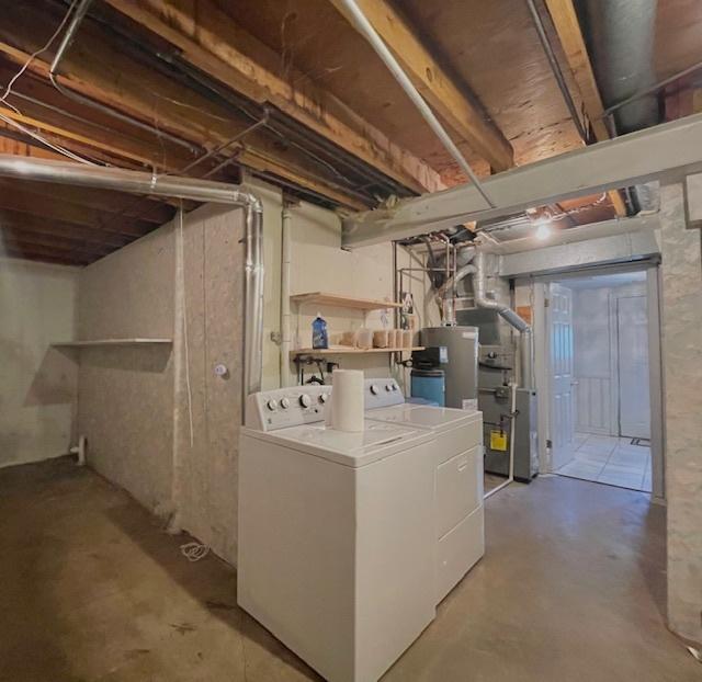 610 E Woodfield Trl, Roselle, IL 60172 - unfinished basement featuring independent washer and dryer and heating unit