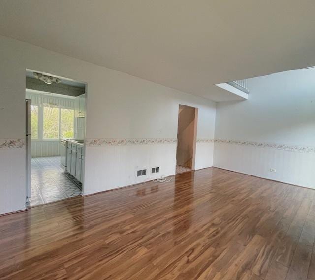 610 E Woodfield Trl, Roselle, IL 60172 - unfurnished room with wood finished floors