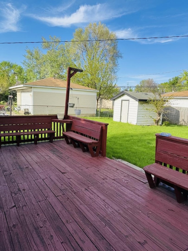 603 Kingston Dr, Romeoville, IL 60446 - wooden terrace featuring an outdoor structure and a storage shed