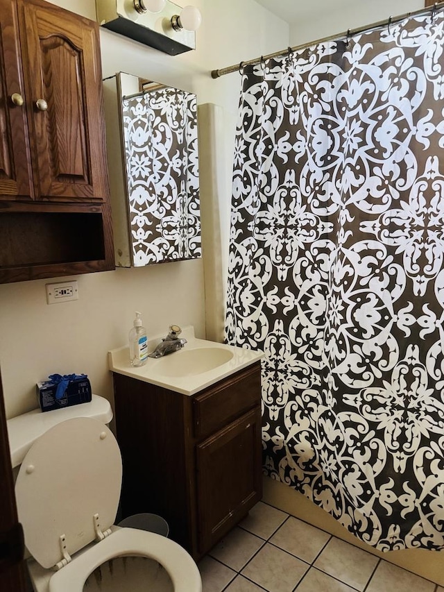 603 Kingston Dr, Romeoville, IL 60446 - bathroom featuring tile patterned floors, toilet, and vanity