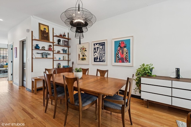 837 W 34th Pl, Chicago, IL 60608 - dining room with light wood-type flooring, baseboards, a chandelier, and recessed lighting