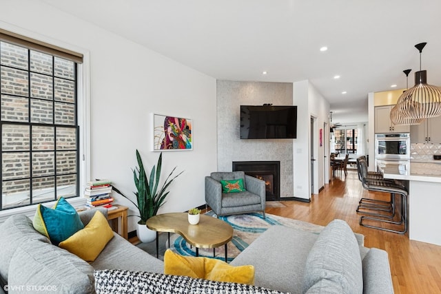 837 W 34th Pl, Chicago, IL 60608 - living room featuring a fireplace, light wood finished floors, and recessed lighting