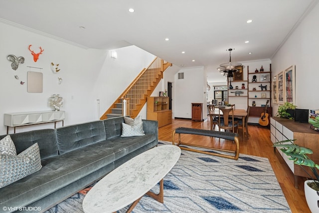 837 W 34th Pl, Chicago, IL 60608 - living room with stairs, ornamental molding, wood finished floors, and recessed lighting