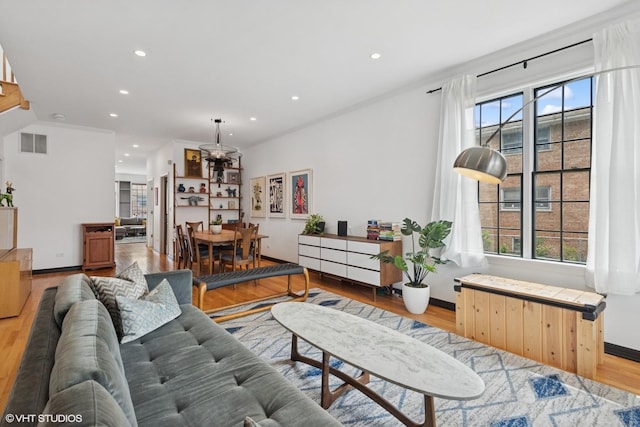 837 W 34th Pl, Chicago, IL 60608 - living room with wood finished floors, recessed lighting, and baseboards
