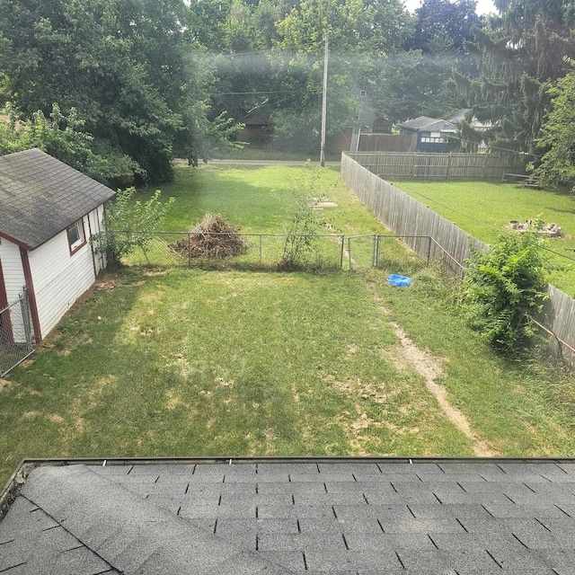 view of yard featuring a fenced backyard
