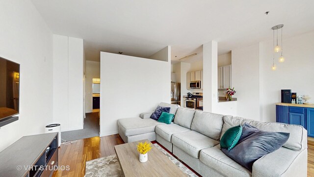 340 W Superior St Unit 1602, Chicago, IL 60654 - living room featuring wood finished floors