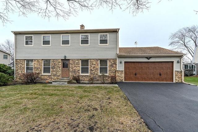 249 S Arlington Heights Rd, Elk Grove Village, IL 60007 - colonial inspired home featuring an attached garage, a chimney, a front lawn, and aphalt driveway