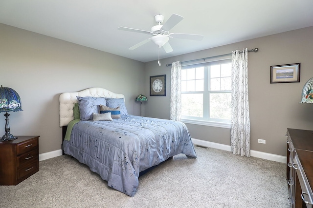 12911 Mayfair Dr, Lemont, IL 60439 - bedroom featuring light colored carpet, baseboards, and ceiling fan