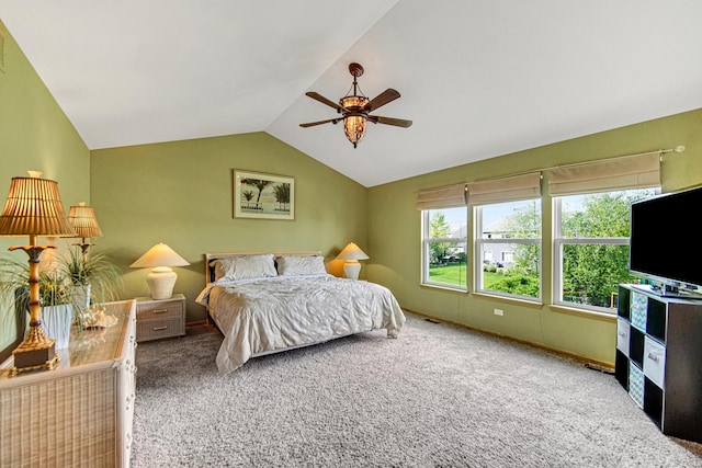 carpeted bedroom with lofted ceiling and ceiling fan