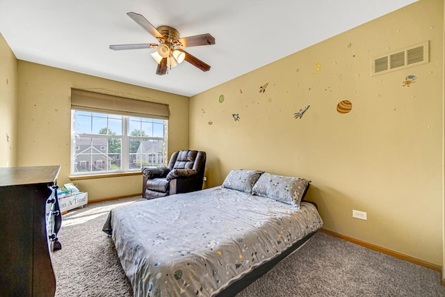 bedroom with carpet floors, baseboards, and ceiling fan