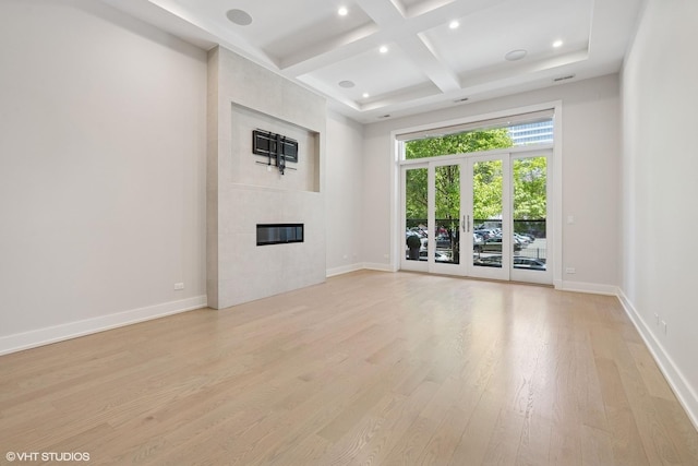 216 S Green St Unit 1N, Chicago, IL 60607 - unfurnished living room with coffered ceiling, recessed lighting, light wood-style floors, beam ceiling, and baseboards
