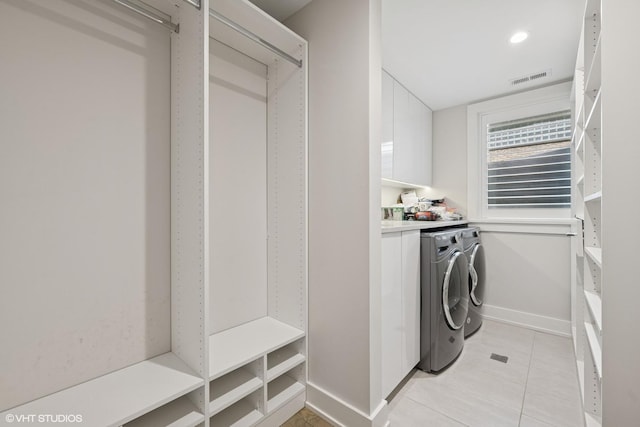 216 S Green St Unit 1N, Chicago, IL 60607 - washroom with independent washer and dryer, baseboards, and light tile patterned floors
