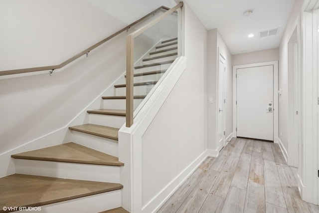216 S Green St Unit 1N, Chicago, IL 60607 - stairway featuring wood finished floors, recessed lighting, and baseboards