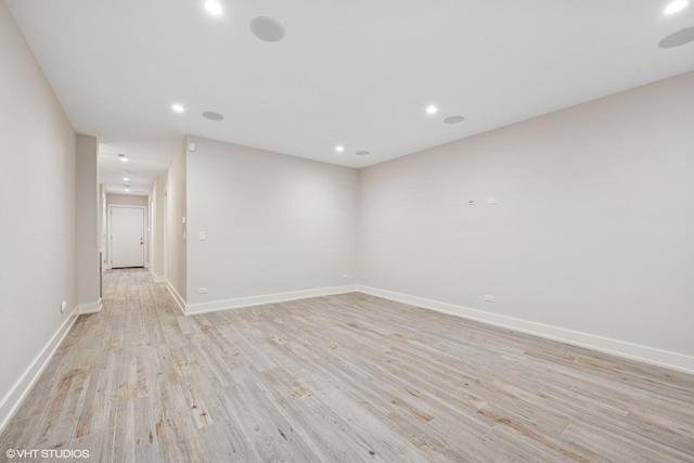 216 S Green St Unit 1N, Chicago, IL 60607 - empty room featuring light wood-style flooring, recessed lighting, and baseboards