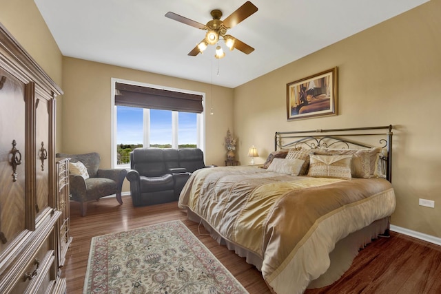 390 S Western Ave Unit 703, Des Plaines, IL 60016 - bedroom featuring baseboards, a ceiling fan, and wood finished floors