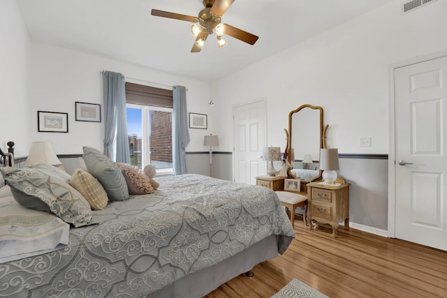 390 S Western Ave Unit 703, Des Plaines, IL 60016 - bedroom featuring wood finished floors, access to exterior, visible vents, baseboards, and ceiling fan
